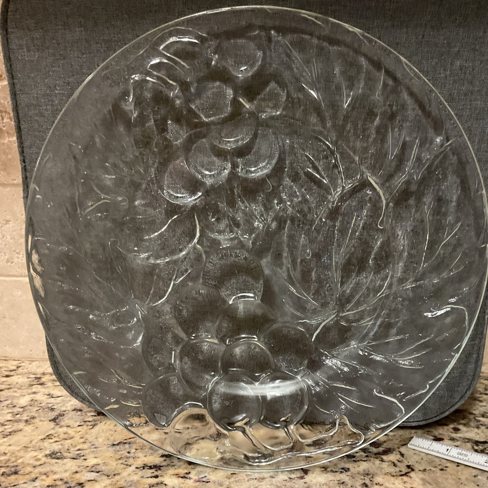 KIG Indonesia Vintage clear glass plate with an embossed grape and leaf design.